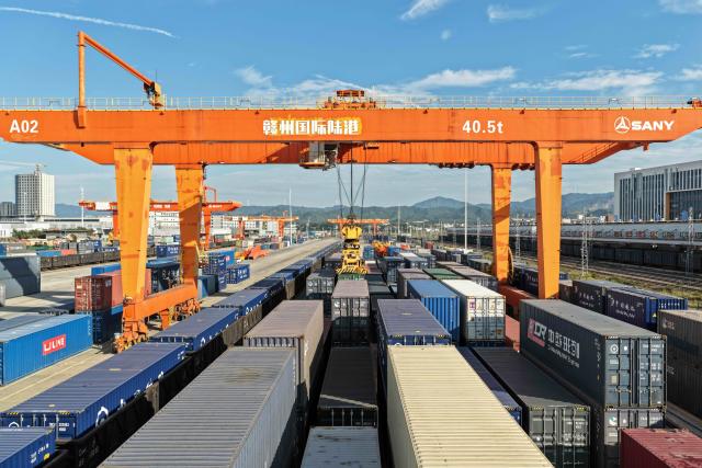 (251125) -- GANZHOU, Nov. 25, 2025 (Xinhua) -- This photo taken on Nov. 19, 2025 shows containers at the Ganzhou International Inland Port in Ganzhou, east China's Jiangxi Province. TO GO WITH "Across China: China-Europe freight train turns inland furniture hub into global trade player" (Photo by Zou Yang/Xinhua)