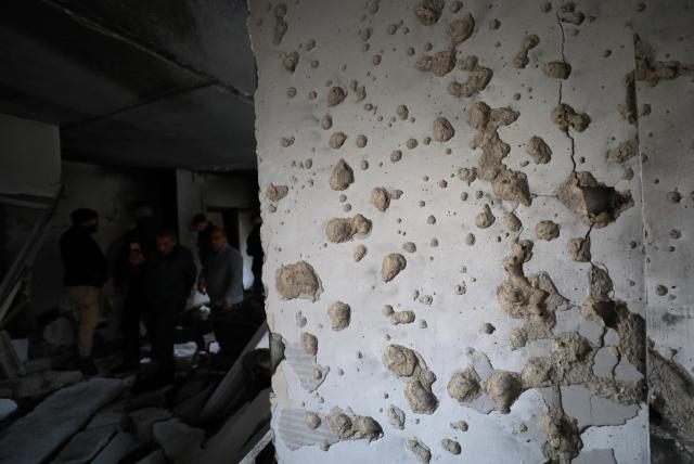(251125) -- NABLUS, Nov. 25, 2025 (Xinhua) -- This photo taken on Nov. 25, 2025 shows a damaged building following an Israeli military operation in the West Bank city of Nablus. A Palestinian man was killed on Monday evening during an exchange of fire with Israeli forces in the northern West Bank city of Nablus, Palestinian sources said. (Photo by Ayman Nobani/Xinhua)