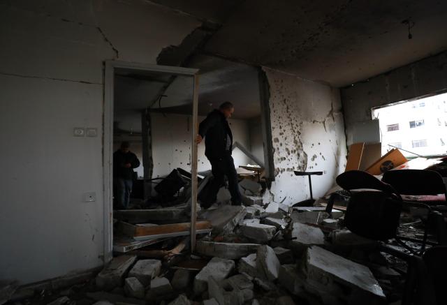 (251125) -- NABLUS, Nov. 25, 2025 (Xinhua) -- This photo taken on Nov. 25, 2025 shows a damaged building following an Israeli military operation in the West Bank city of Nablus. A Palestinian man was killed on Monday evening during an exchange of fire with Israeli forces in the northern West Bank city of Nablus, Palestinian sources said. (Photo by Ayman Nobani/Xinhua)
