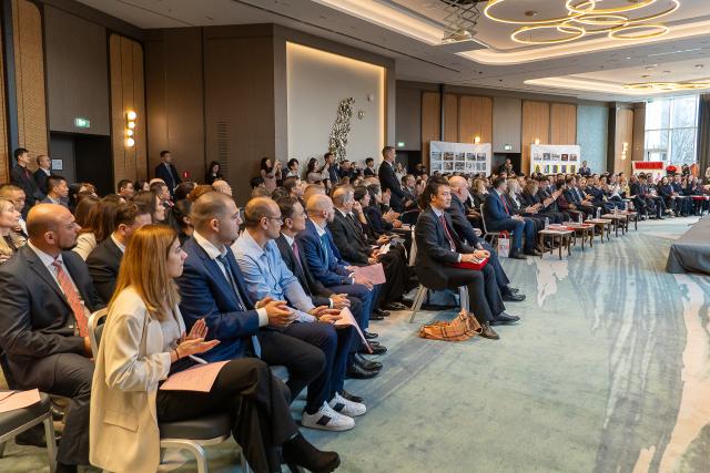 (251125) -- SOFIA, Nov. 25, 2025 (Xinhua) -- People attend an event commemorating the 10th anniversary of Bulgaria and China's cooperation under the Belt and Road Initiative in Sofia, Bulgaria, on Nov. 24, 2025. TO GO WITH: "China, Bulgaria mark anniversary of BRI cooperation " (Photo by Nemanja Cabric/Xinhua)