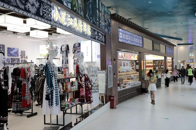 (251125) -- GUIYANG, Nov. 25, 2025 (Xinhua) -- This photo taken on Nov. 6, 2025 shows shops at the Yundu service area of the Huajiang Grand Canyon Bridge in southwest China's Guizhou Province. The Huajiang Grand Canyon Bridge, soaring 625 meters above the Beipan River in Guizhou's mountainous terrain, is the world's highest bridge. The nearby Yundu service area features a comprehensive complex that integrates bridge viewing, sports experiences and other tourism services. (Xinhua/Ou Dongqu)