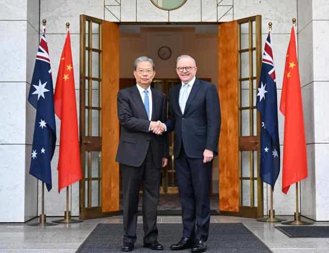 (251125) -- CANBERRA, Nov. 25, 2025 (Xinhua) -- Zhao Leji, chairman of China's National People's Congress Standing Committee, attends a working breakfast held by Australia's Prime Minister Anthony Albanese in Canberra, Australia, Nov. 25, 2025. Zhao paid an official visit to the country from Saturday to Tuesday at the invitation of Australia's Speaker of the Senate Sue Lines and Speaker of the House of Representatives Milton Dick. (Xinhua/Li Xiang)