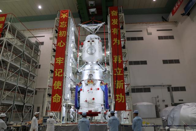 (251125) -- JIUQUAN, Nov. 25, 2025 (Xinhua) -- The Shenzhou-22 spacecraft is being hoisted on Nov. 12, 2025. China on Tuesday launched the Shenzhou-22 spaceship to provide a return vessel for the three Shenzhou-21 astronauts in orbit. This momentous occasion marked the accomplishment of the first emergency launch mission in the country's manned space program.
  The launch of the new spaceship followed the return of the three Shenzhou-20 astronauts back to Earth on Nov. 14 by the Shenzhou-21 spacecraft.
  The return mission, initially scheduled for Nov. 5 by the Shenzhou-20 spaceship, was delayed due to a suspected debris impact on the Shenzhou-20 return capsule's viewport window.
  The Long March-2F Y22 rocket and the Shenzhou-22 spaceship -- already on standby at the launch site upon the contingency -- were swiftly prepared for launch.
   After the initiation of the contingency plan, all teams involved in the project demonstrated a composed and methodical approach.
   Within 20 days, all participating research and testing units collaborated and completed a series of critical tasks, including risk assessment, solution analysis and decision-making, personnel and material deployment, crew return aboard a replacement vessel, as well as an emergency launch, offering a world-class example of managing an in-orbit emergency, the China Manned Space Agency said.
   The success of this mission fully demonstrated the strengths of China's new system for mobilizing resources nationwide, it noted. (Photo by Li Yuxiang/Xinhua)