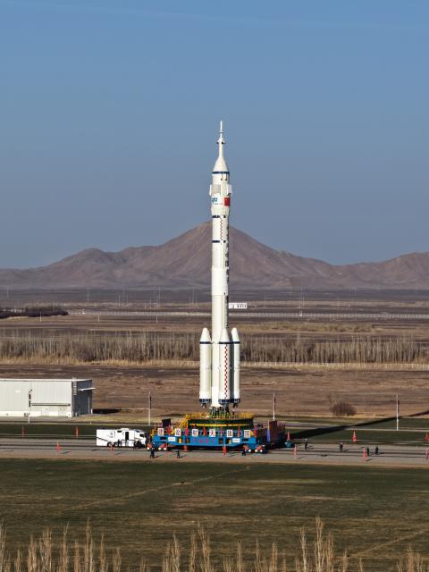 (251125) -- JIUQUAN, Nov. 25, 2025 (Xinhua) -- This photo taken on Nov. 20, 2025 shows the combination of the Shenzhou-22 spaceship and the Long March-2F Y22 rocket being transferred to the launching area. China on Tuesday launched the Shenzhou-22 spaceship to provide a return vessel for the three Shenzhou-21 astronauts in orbit. This momentous occasion marked the accomplishment of the first emergency launch mission in the country's manned space program.
  The launch of the new spaceship followed the return of the three Shenzhou-20 astronauts back to Earth on Nov. 14 by the Shenzhou-21 spacecraft.
  The return mission, initially scheduled for Nov. 5 by the Shenzhou-20 spaceship, was delayed due to a suspected debris impact on the Shenzhou-20 return capsule's viewport window.
  The Long March-2F Y22 rocket and the Shenzhou-22 spaceship -- already on standby at the launch site upon the contingency -- were swiftly prepared for launch.
   After the initiation of the contingency plan, all teams involved in the project demonstrated a composed and methodical approach.
   Within 20 days, all participating research and testing units collaborated and completed a series of critical tasks, including risk assessment, solution analysis and decision-making, personnel and material deployment, crew return aboard a replacement vessel, as well as an emergency launch, offering a world-class example of managing an in-orbit emergency, the China Manned Space Agency said.
   The success of this mission fully demonstrated the strengths of China's new system for mobilizing resources nationwide, it noted. (Photo by Hao Yutong/Xinhua)