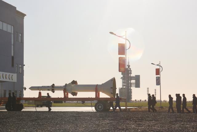 (251125) -- JIUQUAN, Nov. 25, 2025 (Xinhua) -- The escape tower is being transferred on Nov. 18, 2025. China on Tuesday launched the Shenzhou-22 spaceship to provide a return vessel for the three Shenzhou-21 astronauts in orbit. This momentous occasion marked the accomplishment of the first emergency launch mission in the country's manned space program.
  The launch of the new spaceship followed the return of the three Shenzhou-20 astronauts back to Earth on Nov. 14 by the Shenzhou-21 spacecraft.
  The return mission, initially scheduled for Nov. 5 by the Shenzhou-20 spaceship, was delayed due to a suspected debris impact on the Shenzhou-20 return capsule's viewport window.
  The Long March-2F Y22 rocket and the Shenzhou-22 spaceship -- already on standby at the launch site upon the contingency -- were swiftly prepared for launch.
   After the initiation of the contingency plan, all teams involved in the project demonstrated a composed and methodical approach.
   Within 20 days, all participating research and testing units collaborated and completed a series of critical tasks, including risk assessment, solution analysis and decision-making, personnel and material deployment, crew return aboard a replacement vessel, as well as an emergency launch, offering a world-class example of managing an in-orbit emergency, the China Manned Space Agency said.
   The success of this mission fully demonstrated the strengths of China's new system for mobilizing resources nationwide, it noted. (Photo by Pang Zhaoqi/Xinhua)