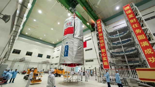 (251125) -- JIUQUAN, Nov. 25, 2025 (Xinhua) -- The Shenzhou-22 spacecraft is being hoisted on Nov. 12, 2025. China on Tuesday launched the Shenzhou-22 spaceship to provide a return vessel for the three Shenzhou-21 astronauts in orbit. This momentous occasion marked the accomplishment of the first emergency launch mission in the country's manned space program.
  The launch of the new spaceship followed the return of the three Shenzhou-20 astronauts back to Earth on Nov. 14 by the Shenzhou-21 spacecraft.
  The return mission, initially scheduled for Nov. 5 by the Shenzhou-20 spaceship, was delayed due to a suspected debris impact on the Shenzhou-20 return capsule's viewport window.
  The Long March-2F Y22 rocket and the Shenzhou-22 spaceship -- already on standby at the launch site upon the contingency -- were swiftly prepared for launch.
   After the initiation of the contingency plan, all teams involved in the project demonstrated a composed and methodical approach.
   Within 20 days, all participating research and testing units collaborated and completed a series of critical tasks, including risk assessment, solution analysis and decision-making, personnel and material deployment, crew return aboard a replacement vessel, as well as an emergency launch, offering a world-class example of managing an in-orbit emergency, the China Manned Space Agency said.
   The success of this mission fully demonstrated the strengths of China's new system for mobilizing resources nationwide, it noted. (Photo by Song Ying'ao/Xinhua)