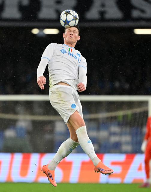(251126) -- NAPLES, Nov. 26, 2025 (Xinhua) -- Napoli's Scott McTominay heads for the ball during the UEFA Champions League match between Napoli and Qarabag in Naples, Italy, Nov. 25, 2025. (Photo by Alberto Lingria/Xinhua)