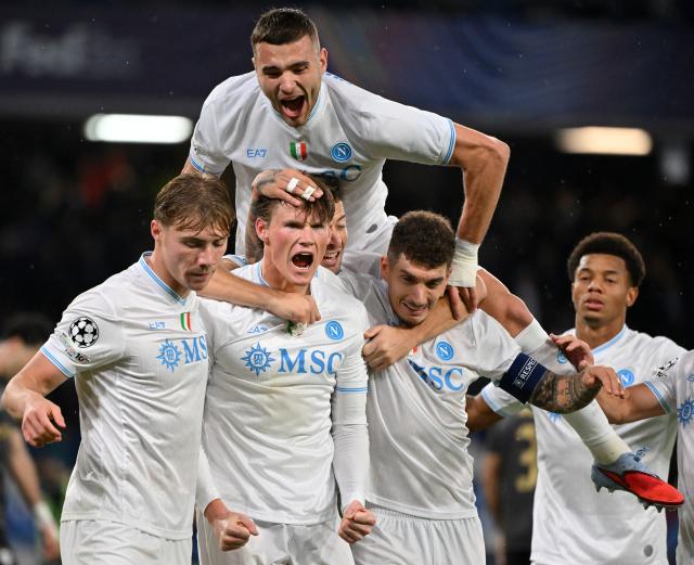 (251126) -- NAPLES, Nov. 26, 2025 (Xinhua) -- Napoli's Scott McTominay (2nd L) celebrates with teammates after scoring during the UEFA Champions League match between Napoli and Qarabag in Naples, Italy, Nov. 25, 2025. (Photo by Alberto Lingria/Xinhua)