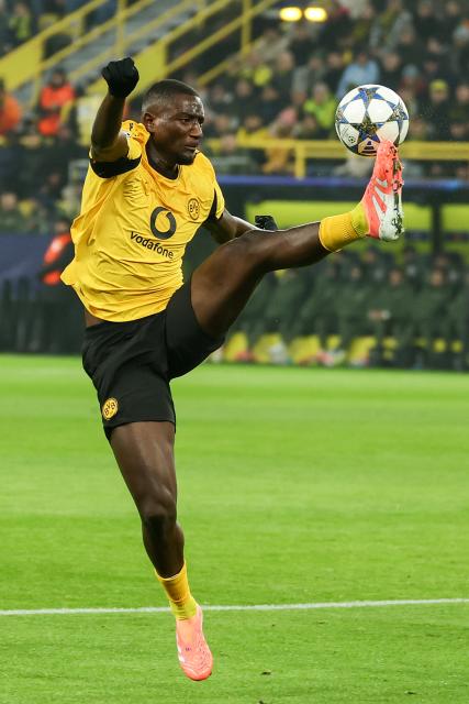 (251126) -- DORTMUND, Nov. 26, 2025 (Xinhua) -- Serhou Guirassy of Borussia Dortmund kicks the ball during the UEFA Champions League group stage 5th round match between Borussia Dortmund and Villarreal CF in Dortmund, Germany, Nov. 25, 2025. (Photo by Joachim Bywaletz/Xinhua)
