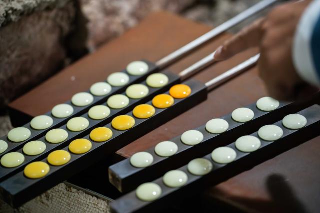 (251126) -- BEIJING, Nov. 26, 2025 (Xinhua) -- This photo taken on Nov. 19, 2025 shows Yongzi (go pieces) being cooled off at a workshop in a Yongzi cultural park in Baoshan City, southwest China's Yunnan Province. (Xinhua/Gao Yongwei)