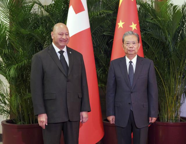 (251126) -- BEIJING, Nov. 26, 2025 (Xinhua) -- Zhao Leji, chairman of the National People's Congress Standing Committee, meets with King Tupou VI of the Kingdom of Tonga in Beijing, capital of China, Nov. 26, 2025. (Xinhua/Ding Lin)