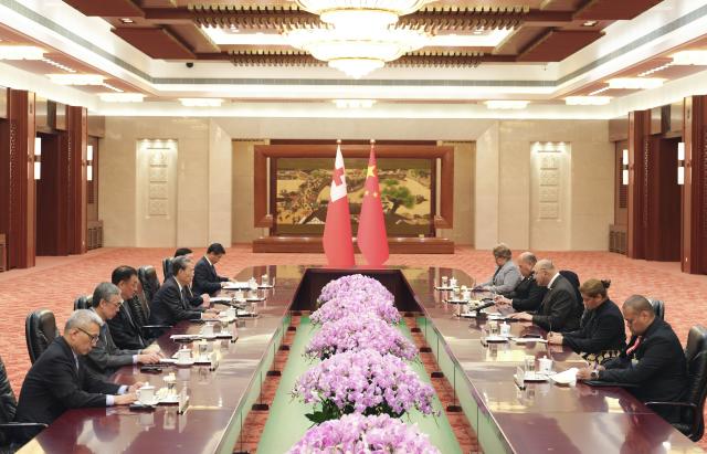 (251126) -- BEIJING, Nov. 26, 2025 (Xinhua) -- Zhao Leji, chairman of the National People's Congress Standing Committee, meets with King Tupou VI of the Kingdom of Tonga in Beijing, capital of China, Nov. 26, 2025. (Xinhua/Ding Lin)