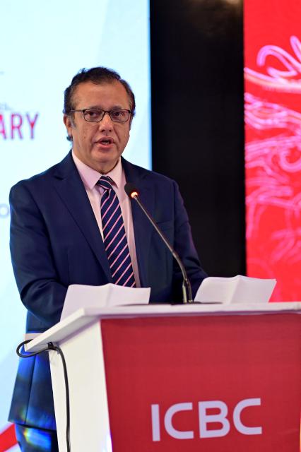 (251126) -- KARACHI, Nov. 26, 2025 (Xinhua) -- Muhammad Malik, executive director of the State Bank of Pakistan (SBP), addresses an event to mark the 10th anniversary of the Chinese currency renminbi (RMB) internationalization in Pakistan, in Karachi, Pakistan, Nov. 25, 2025. Pakistan has established a comprehensive regulatory framework to support the use and investment of the RMB, Malik said on Tuesday. The event was hosted by the Karachi branch of the Industrial and Commercial Bank of China (ICBC), which serves as the RMB clearing bank in Pakistan. (ICBC's Karachi branch/Handout via Xinhua)