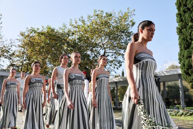 (251126) -- ANCIENT OLYMPIA, Nov. 26, 2025 (Xinhua) -- Performers in the role of priestesses are seen before the Olympic flame lighting ceremony for the Milan-Cortina 2026 Winter Olympic Games in Ancient Olympia, Greece, on Nov. 26, 2025. (Xinhua/Li Jing)