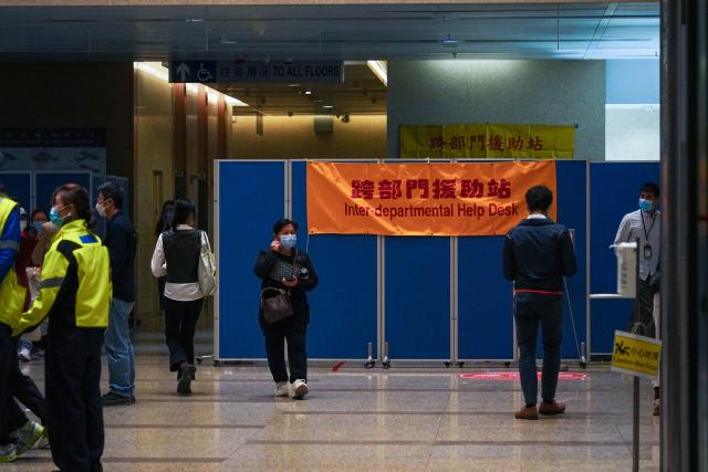 (251126) -- HONG KONG, Nov. 26, 2025 (Xinhua) -- An inter-departmental help desk is set at Prince of Wales Hospital after a fire broke out at a residential building in the Tai Po area in Hong Kong, south China, Nov. 26, 2025. Thirteen people were killed after a huge fire engulfed a residential area in the Tai Po area of Hong Kong on Wednesday afternoon, according to a press release issued by the Hong Kong Special Administrative Region (HKSAR) government. (Xinhua/Zhu Wei)