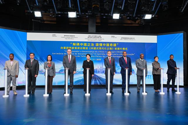 (251127) -- MACAO, Nov. 27, 2025 (Xinhua) -- This photo taken on Nov. 26, 2025 shows a ceremony to present a documentary on Chinese modernization to Portuguese-speaking countries' television networks in Macao, south China. TO GO WITH "Commissioner's office of Chinese Foreign Ministry in Macao SAR presents documentary to Portuguese-speaking broadcasters" (Xinhua)
