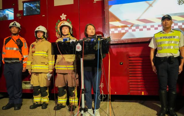 (251127) -- HONG KONG, Nov. 27, 2025 (Xinhua) -- A press briefing is held by the Hong Kong Police Force and the Fire Services Department in Hong Kong, south China, on Nov. 27, 2025. Three men have been arrested for suspected manslaughter in a fire that broke out in Wang Fuk Court, a residential area in Tai Po of Hong Kong, on Wednesday afternoon, the Hong Kong Police Force said at the press briefing on Thursday.
   The fire had left 44 people dead and 45 others injured by early Thursday morning, the police said. (Xinhua/Zhu Wei)