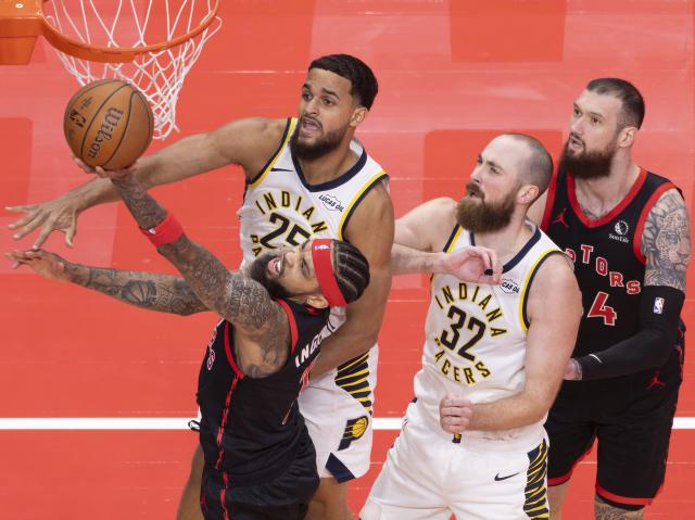 (251127) -- TORONTO, Nov. 27, 2025 (Xinhua) -- Brandon Ingram (front) of Toronto Raptors goes for a layup during the 2025-2026 NBA Cup group match between Toronto Raptors and Indiana Pacers in Toronto, Canada, on Nov. 26, 2025. (Photo by Zou Zheng/Xinhua)