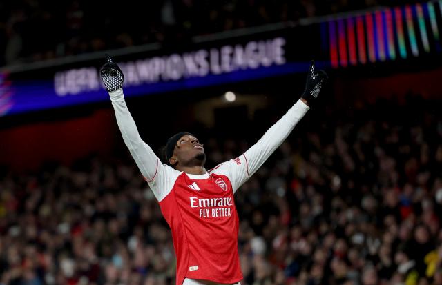 (251127) -- LONDON, Nov. 27, 2025 (Xinhua) -- Arsenal's Noni Madueke celebrates scoring during the UEFA Champions League football match between Arsenal and Bayern Munich in London, Britain, Nov. 26, 2025. (Xinhua/Li Ying)