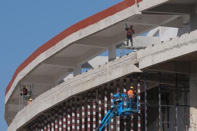 (251127) -- XINCHANG, Nov. 27, 2025 (Xinhua) -- Constructors work at the construction site of the Xinchang College of Zhejiang Industry Polytechnic College in Xinchang County of Shaoxing City, east China's Zhejiang Province, Nov. 26, 2025. Covering approximately 600 mu (about 40 hectares), the Xinchang College of Zhejiang Industry Polytechnic College is the first institution of higher education currently under construction in Xinchang County of Zhejiang. It will accommodate around 6,000 students and faculty members upon completion. (Xinhua/Huang Zongzhi)