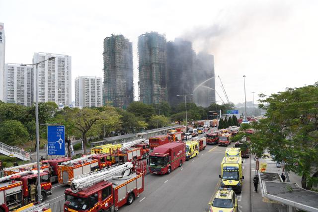 (251127) -- HONG KONG, Nov. 27, 2025 (Xinhua) -- This photo taken on Nov. 27, 2025 shows a scene at the rescue site in Wang Fuk Court, a residential area in Tai Po of Hong Kong, south China. Firefighters had rescued 55 people in the major fire in the residential complex Wang Fuk Court in Hong Kong, John Lee, chief executive of the Hong Kong Special Administrative Region, said at a press briefing on Thursday. (Xinhua/Chen Duo)