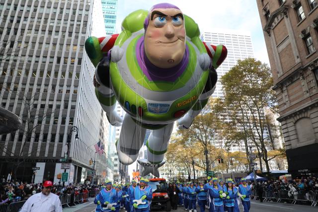 (251127) -- NEW YORK, Nov. 27, 2025 (Xinhua) -- The balloon of Buzz Lightyear is seen during the 2025 Macy's Thanksgiving Day Parade in New York, the United States, on Nov. 27, 2025. The traditional Macy's Thanksgiving Day Parade brought holiday cheer to New York City on Thursday morning, as giant character balloons floated above Manhattan in one of the United States' most watched holiday events. (Xinhua/Zhang Fengguo)