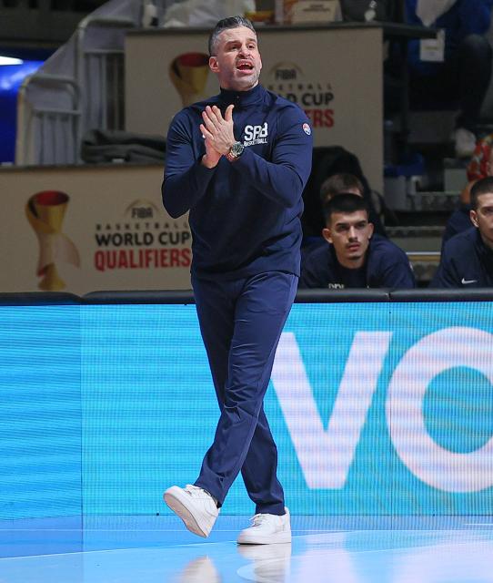 (251128) -- BELGRADE, Nov. 28, 2025 (Xinhua) -- Serbia's head coach Dusan Alimpijevic reacts during the FIBA basketball World Cup 2027 European qualifiers first round group C match between Serbia and Switzerland in Belgrade, Serbia, Nov. 27, 2025. (Photo by Predrag Milosavljevic/Xinhua)
