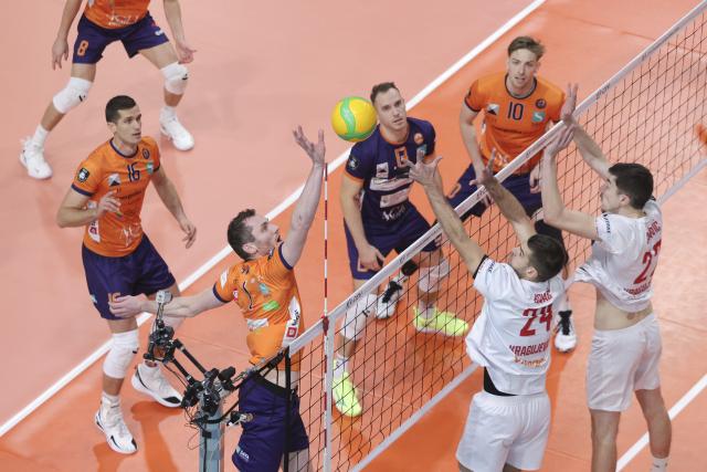(251128) -- LJUBLJANA, Nov. 28, 2025 (Xinhua) -- Toncek Stern (2nd L) of ACH Volley Ljubljana competes during the CEV Champions League Volley 2026 Men's 3rd round volleyball match between ACH Volley Ljubljana and Radnicki Kragujevac in Ljubljana, Slovenia, Nov. 27, 2025. (Photo by Zeljko Stevanic/Xinhua)