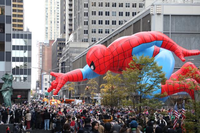 (251128) -- BEIJING, Nov. 28, 2025 (Xinhua) -- The balloon of Spider-Man is seen during the 2025 Macy's Thanksgiving Day Parade in New York, the United States, on Nov. 27, 2025. New York City boosted security during the Macy´s Thanksgiving Day Parade on Thursday. (Xinhua/Zhang Fengguo)