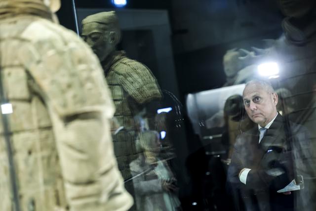 (251128) -- BUDAPEST, Nov. 28, 2025 (Xinhua) -- A visitor views exhibits at the exhibition "Civilization of the Qin and Han Dynasties - The First Chinese Emperor's Terracotta Warriors" at the Museum of Fine Arts in Budapest, Hungary, Nov. 27, 2025. The Museum of Fine Arts in Budapest on Thursday opened one of the most significant Chinese cultural exhibitions ever held in Hungary, presenting more than 150 ancient artworks from the Qin and Han dynasties (221 BC-220 AD), including ten original Terracotta Warriors.
   Titled "Civilization of the Qin and Han Dynasties - The First Chinese Emperor's Terracotta Warriors," the exhibition is jointly organized by the Museum of Fine Arts in Budapest and the Shaanxi Provincial Cultural Heritage Administration, and it will run for six months starting from Friday. (Photo by David Balogh/Xinhua)