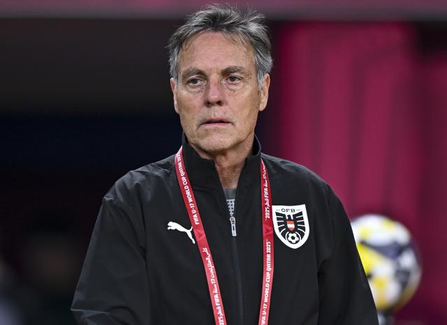 (251128) -- DOHA, Nov. 28, 2025 (Xinhua) -- Hermann Stadler, head Coach of Austria, looks on prior to the final match between Portugal and Austria at the FIFA U17 World Cup Qatar 2025 in Doha, Qatar, Nov. 27, 2025. Portugal won 1-0. (Photo by Nikku/Xinhua)