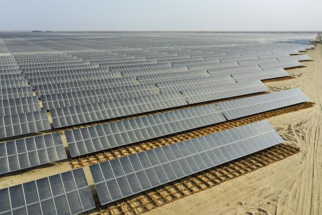 (251128) -- URUMQI, Nov. 28, 2025 (Xinhua) -- A drone photo taken on April 13, 2025 shows a photovoltaic power project in Shaya County, Aksu Prefecture, northwest China's Xinjiang Uygur Autonomous Region. (Xinhua/Ding Lei)