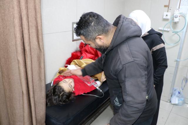 (251128) -- DAMASCUS, Nov. 28, 2025 (Xinhua) -- A girl injured in an Israeli airstrike receives medical treatment at al-Mouwasat Hospital in Damascus, Syria, Nov. 28, 2025. Israeli airstrikes early Friday killed at least 10 people, including women and children, in the town of Beit Jinn in the southwestern countryside of Damascus, following reported clashes between Israeli troops and local residents, Syrian state media said. (Photo by Monsef Memari/Xinhua)
