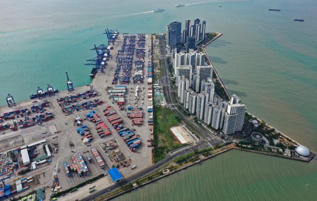 (251129) -- BEIJING, Nov. 29, 2025 (Xinhua) -- An aerial drone photo taken on Nov. 27, 2025 shows a view of the Haikou Port in Haikou, south China's Hainan Province. China's Hainan Free Trade Port (FTP) will launch island-wide independent customs operations as of Dec. 18, a major milestone in the opening-up drive of the world's second-largest economy despite rising protectionism worldwide. (Xinhua/Guo Cheng)