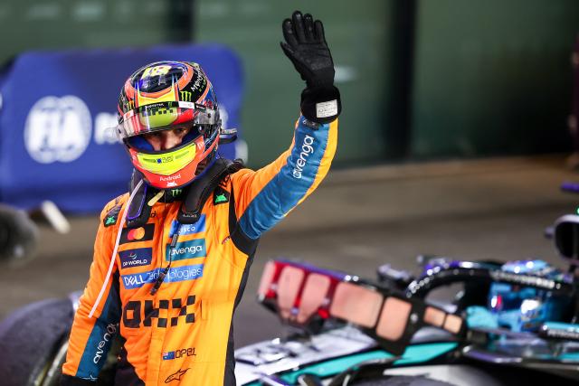 (251130) -- DOHA, Nov. 30, 2025 (Xinhua) -- McLaren's Australian Driver Oscar Piastri waves his hand after winning the Sprint race of the Formula One Qatar Grand Prix at the Lusail International Circuit in Doha, Qatar, on Nov. 29, 2025. (Photo by Li Chao/Xinhua)