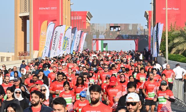 (251130) -- CAPITAL GOVERNORATE, Nov. 30, 2025 (Xinhua) -- People participate in a marathon race in Capital Governorate, Kuwait, Nov. 29, 2025. (Photo by Asad/Xinhua)