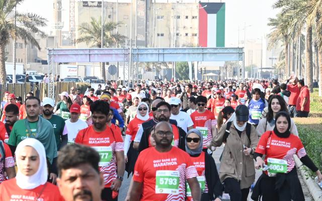 (251130) -- CAPITAL GOVERNORATE, Nov. 30, 2025 (Xinhua) -- People participate in a marathon race in Capital Governorate, Kuwait, Nov. 29, 2025. (Photo by Asad/Xinhua)