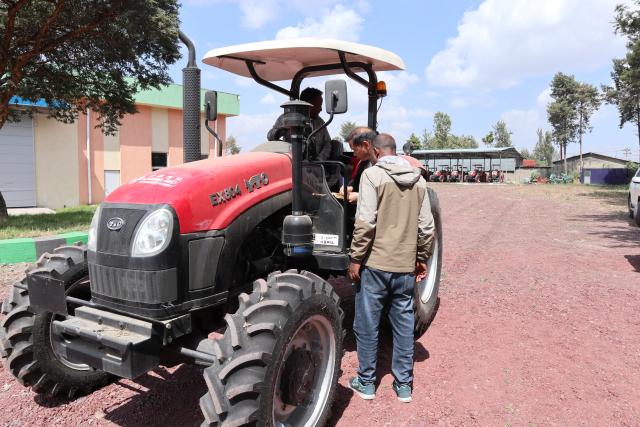 (251130) -- ADDIS ABABA, Nov. 30, 2025 (Xinhua) -- This photo taken on Nov. 26, 2025 in Godino Jitu Village, Ethiopia, shows a tractor donated by the Chinese agricultural expert team.
  TO GO WITH "Feature: Chinese experts drive integrated farming, transforming rural livelihoods in Ethiopia" (Xinhua/Liu Fangqiang)