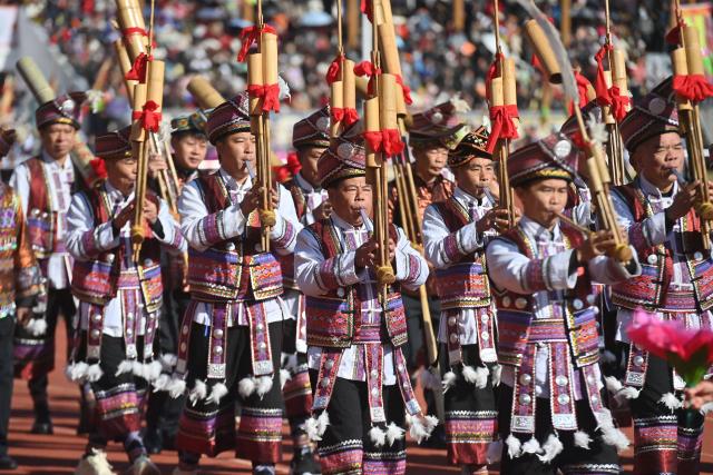 (251130) -- NANNING, Nov. 30, 2025 (Xinhua) -- Performers play Lusheng, a traditional reed-pipe wind instrument, to celebrate Lusheng and horse fighting festival in Rongshui Miao Autonomous County, south China's Guangxi Zhuang Autonomous Region, Nov. 29, 2025. Rongshui County has leveraged its unique cultural resources of Lusheng to strengthen the inheritance of Miao ethnic culture and empower rural revitalization. (Xinhua/Huang Xiaobang)