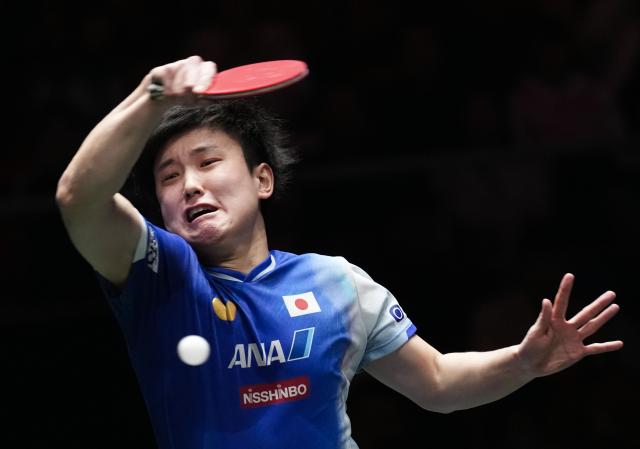 (251130) -- CHENGDU, Nov. 30, 2025 (Xinhua) -- Harimoto Tomokazu of Japan hits a return during the men's singles match against Lum Nicholas of Australia during the stage 1 group match between Japan and Australia at the ITTF Mixed Team World Cup 2025 in Chengdu, southwest China's Sichuan Province, Nov. 30, 2025. (Xinhua/Wang Ying)