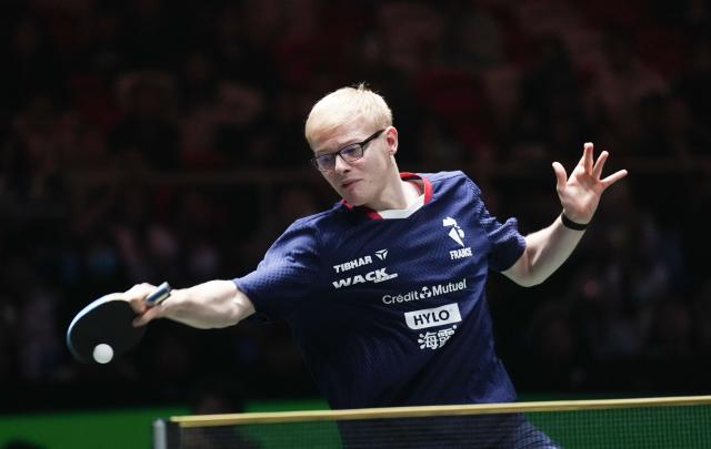 (251130) -- CHENGDU, Nov. 30, 2025 (Xinhua) -- Felix Lebrun of France hits a return during the men's singles match against Felipe Arado of Brazil during the stage 1 group match between France and Brazil at the ITTF Mixed Team World Cup 2025 in Chengdu, southwest China's Sichuan Province, Nov. 30, 2025. (Xinhua/Wang Ying)