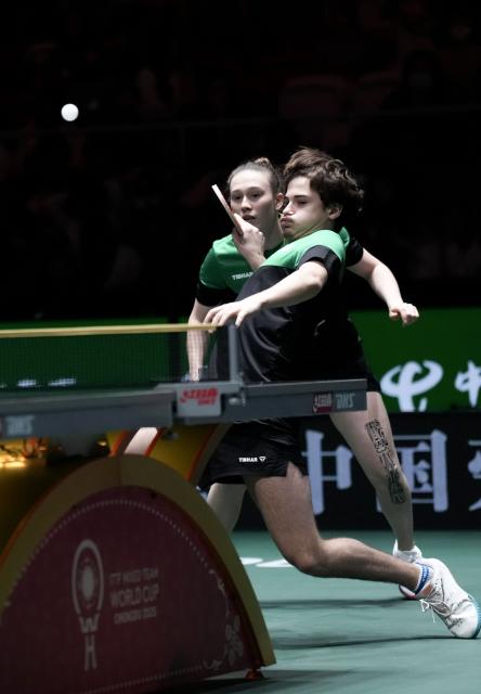 (251130) -- CHENGDU, Nov. 30, 2025 (Xinhua) -- Victoria Strassburger/Lucas Romanski (R) of Brazil compete during the mixed doubles match against Alexis Lebrun/Jia Nan Yuan of France during the stage 1 group match between France and Brazil at the ITTF Mixed Team World Cup 2025 in Chengdu, southwest China's Sichuan Province, Nov. 30, 2025. (Xinhua/Wang Ying)