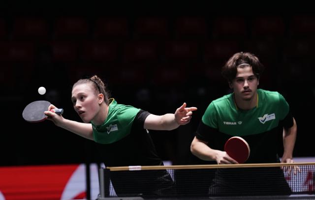 (251130) -- CHENGDU, Nov. 30, 2025 (Xinhua) -- Victoria Strassburger (L)/Lucas Romanski of Brazil compete during the mixed doubles match against Alexis Lebrun/Jia Nan Yuan of France during the stage 1 group match between France and Brazil at the ITTF Mixed Team World Cup 2025 in Chengdu, southwest China's Sichuan Province, Nov. 30, 2025. (Xinhua/Wang Ying)