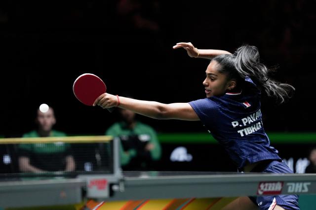 (251130) -- CHENGDU, Nov. 30, 2025 (Xinhua) -- Prithika Pavade of France hits a return during the women's singles match against Laura Watanabe of Brazil during the stage 1 group match between France and Brazil at the ITTF Mixed Team World Cup 2025 in Chengdu, southwest China's Sichuan Province, Nov. 30, 2025. (Xinhua/Wang Ying)