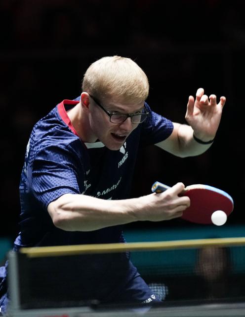 (251130) -- CHENGDU, Nov. 30, 2025 (Xinhua) -- Felix Lebrun of France hits a return during the men's singles match against Felipe Arado of Brazil during the stage 1 group match between France and Brazil at the ITTF Mixed Team World Cup 2025 in Chengdu, southwest China's Sichuan Province, Nov. 30, 2025. (Xinhua/Wang Ying)