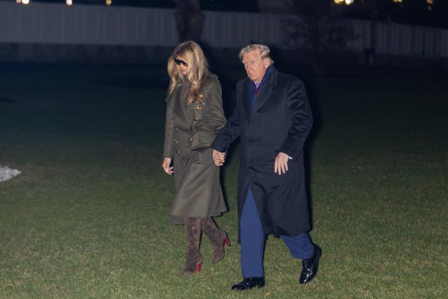 (251201) -- WASHINGTON, Dec. 1, 2025 (Xinhua) -- U.S. President Donald Trump and First Lady Melania Trump arrive at the White House in Washington, D.C., the United States, Nov. 30, 2025. U.S. President Donald Trump confirmed on Sunday that he had a phone call with Venezuelan President Nicolas Maduro, but refused to reveal any details of the call, according to The New York Times. (Xinhua/Hu Yousong)