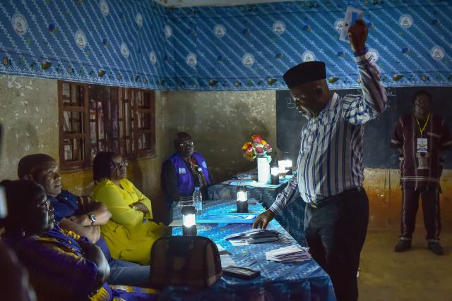 (251201) -- BANGANTE, Dec. 1, 2025 (Xinhua) -- Election officials count ballots during Cameroon's regional elections at a polling station in Bangante, Cameroon, Nov. 30, 2025. Voting for Cameroon's regional elections began early Sunday, with polling starting nationwide at 8 a.m. (0700 GMT) local time.
  Municipal councilors and traditional rulers will elect 900 regional councilors to serve five-year terms, with 90 in each of the country's 10 regions. (Xinhua/Kepseu)