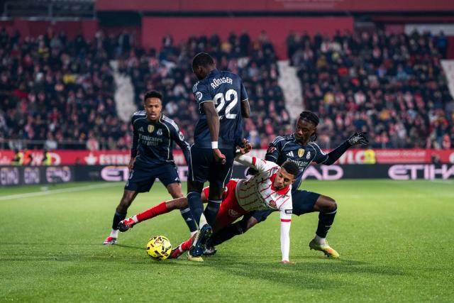 (251201) -- GIRONA, Dec. 1, 2025 (Xinhua) -- Ounahi (2nd R) of Girona FC competes during the La Liga football match between Girona FC and Real Madrid CF in Montilivi Stadium, Girona, Spain, on Dec. 1, 2025. (Photo by Joan Gosa/Xinhua)