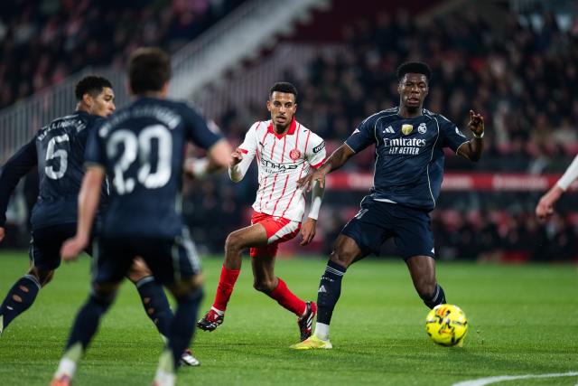 (251201) -- GIRONA, Dec. 1, 2025 (Xinhua) -- Aurelien Tchouameni (1st R) of Real Madrid CF competes during the La Liga football match between Girona FC and Real Madrid CF in Montilivi Stadium, Girona, Spain, on Nov. 30, 2025. (Photo by Joan Gosa/Xinhua)