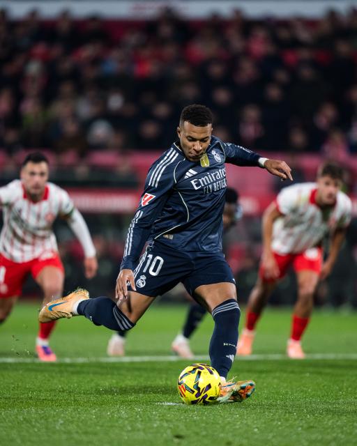 (251201) -- GIRONA, Dec. 1, 2025 (Xinhua) -- Kylian Mbappe of Real Madrid CF shoots during the La Liga football match between Girona FC and Real Madrid CF in Montilivi Stadium, Girona, Spain, on Dec. 1, 2025. (Photo by Joan Gosa/Xinhua)